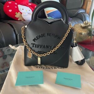 ITEM IS SOLD NEW TIFFANY & CO. RETURN BACK TO TIFFANY BLACK MINI TOTE
